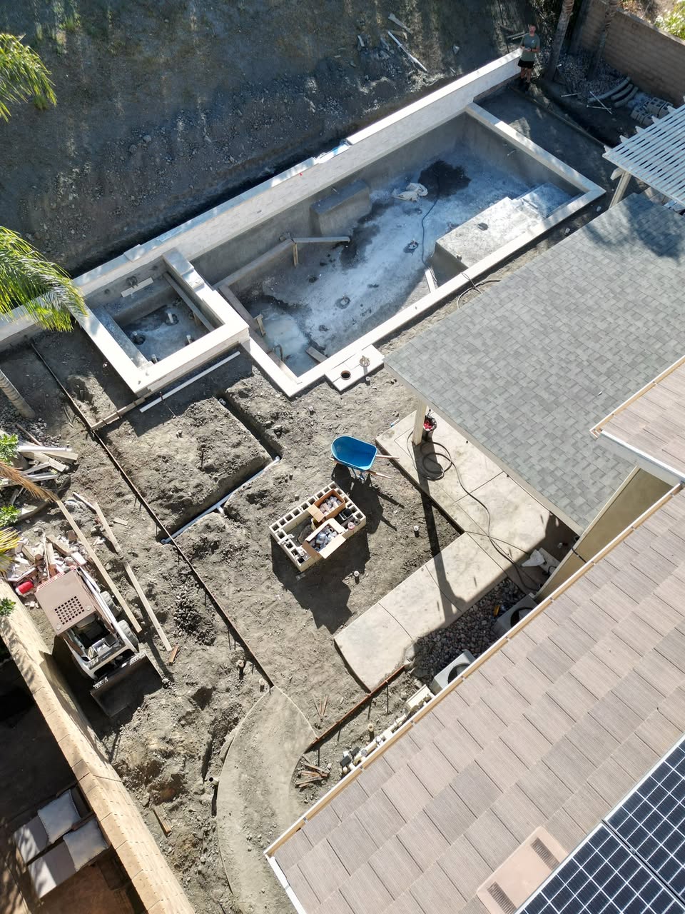 Pool under construction — excavation and steel